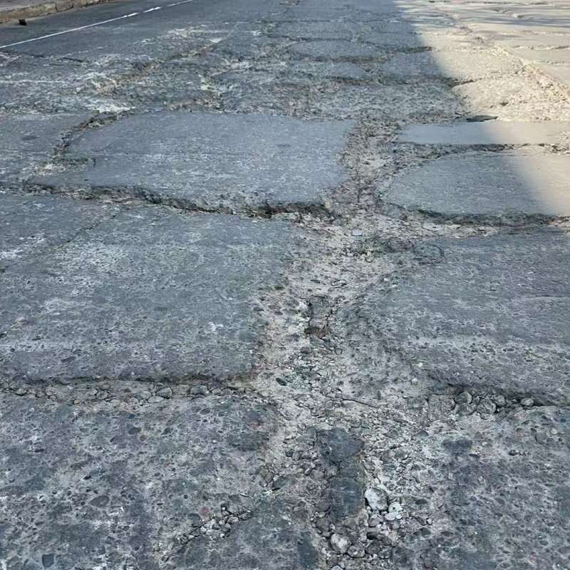 山丹路面起砂露石子修补料